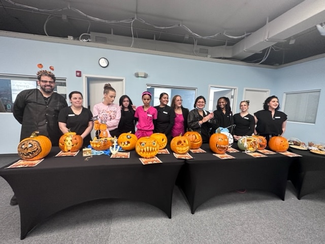 Great Smile Dental team at a pumpkin carving contest
